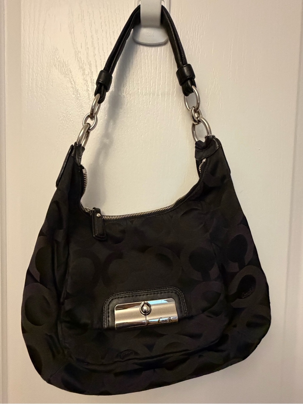 Vintage Coach shoulder bag with cross body strap.